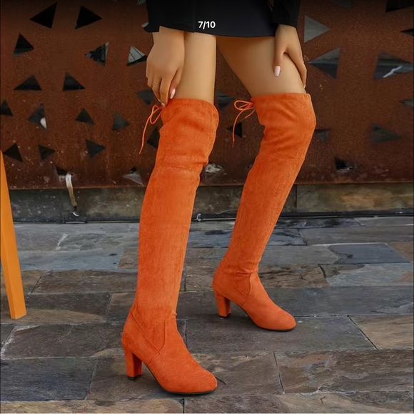 Over the knee boots. Orange and can bee folded down also. Chunky Heals - Picture 2 of 4